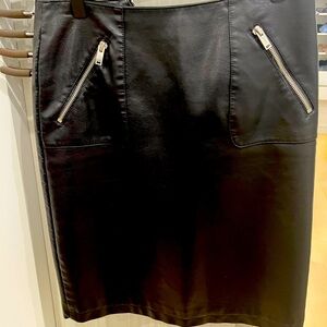 Mini or almost knee high leather skirt with gorgeous cut